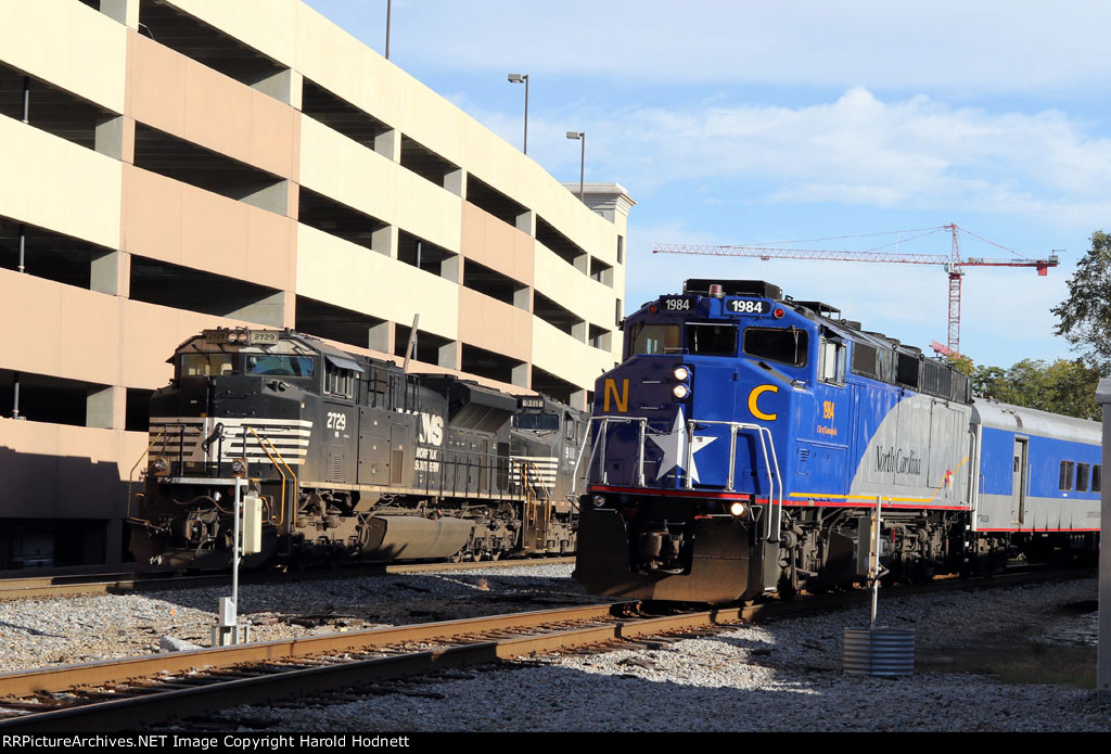 RNCX 1984 leads train P075 past train 351 at Southern Junction